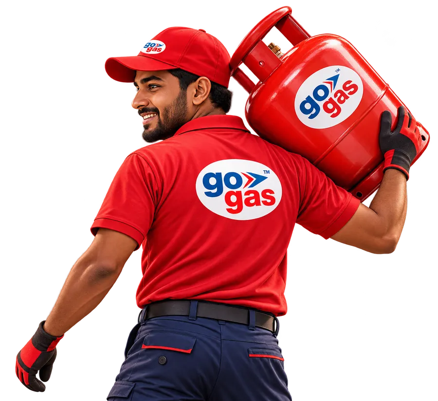 Go Gas delivery worker carrying a red LPG cylinder